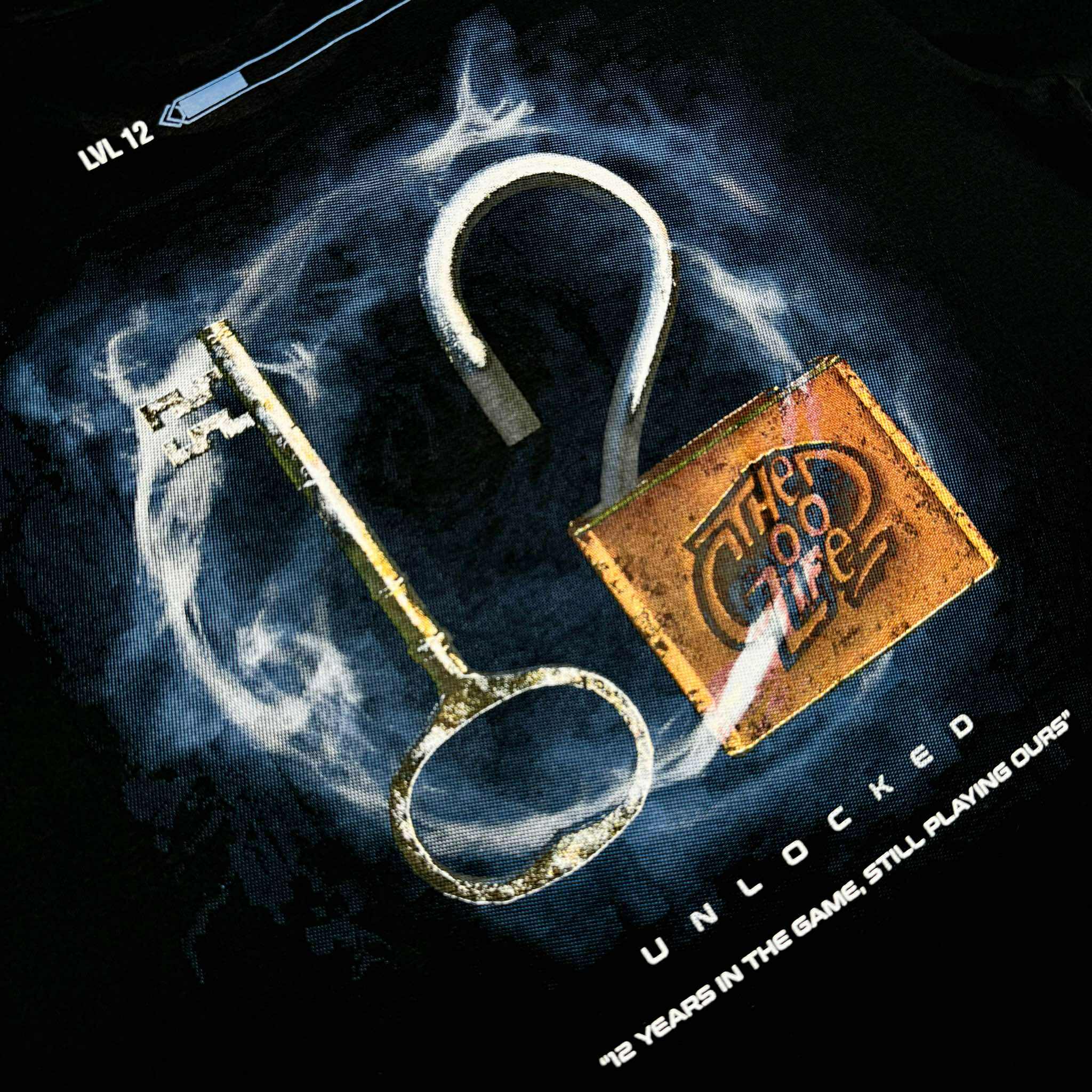 12 UNLOCKED (BLACK) T-SHIRT